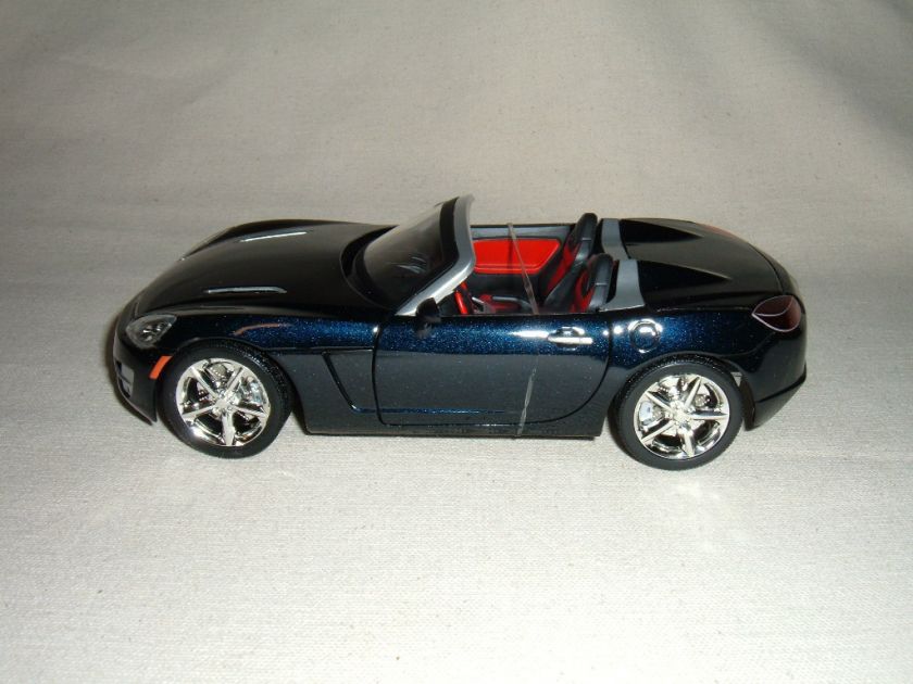 24 scale Diecast dark blue metallic Saturn Sky Roadster ProMark New 