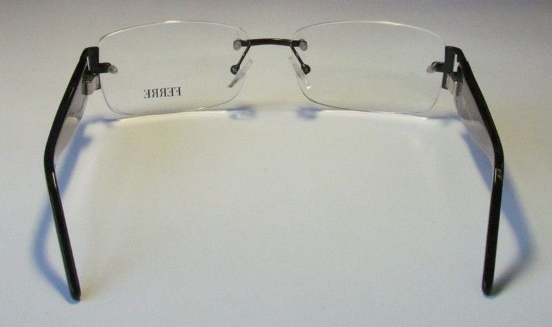   33502 54 15 130 SILVER/BLACK RIMLESS EYEGLASS/GLASSES/FRAME  