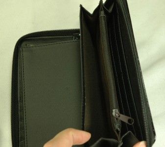   patent style zip around wallet. It comes with a wristlet strap too