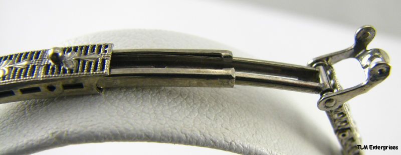 bracelet measures 6 3/4 (17.1cm) in length, the face is 9/16 (13 