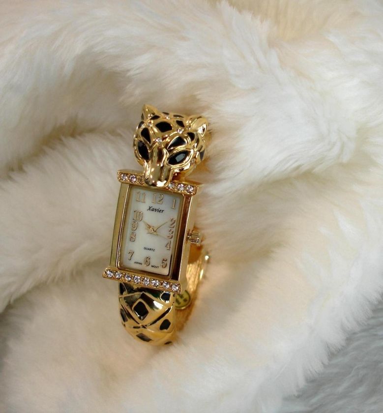 JAGUAR~AUSTRIAN CRYSTAL GOLD TONE LADIES BANGLE WATCH  