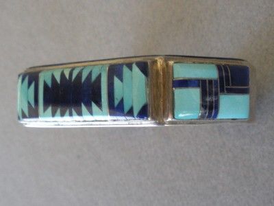 Navajo artist Jackson’s bracelet cuff with inlays of turquoise 